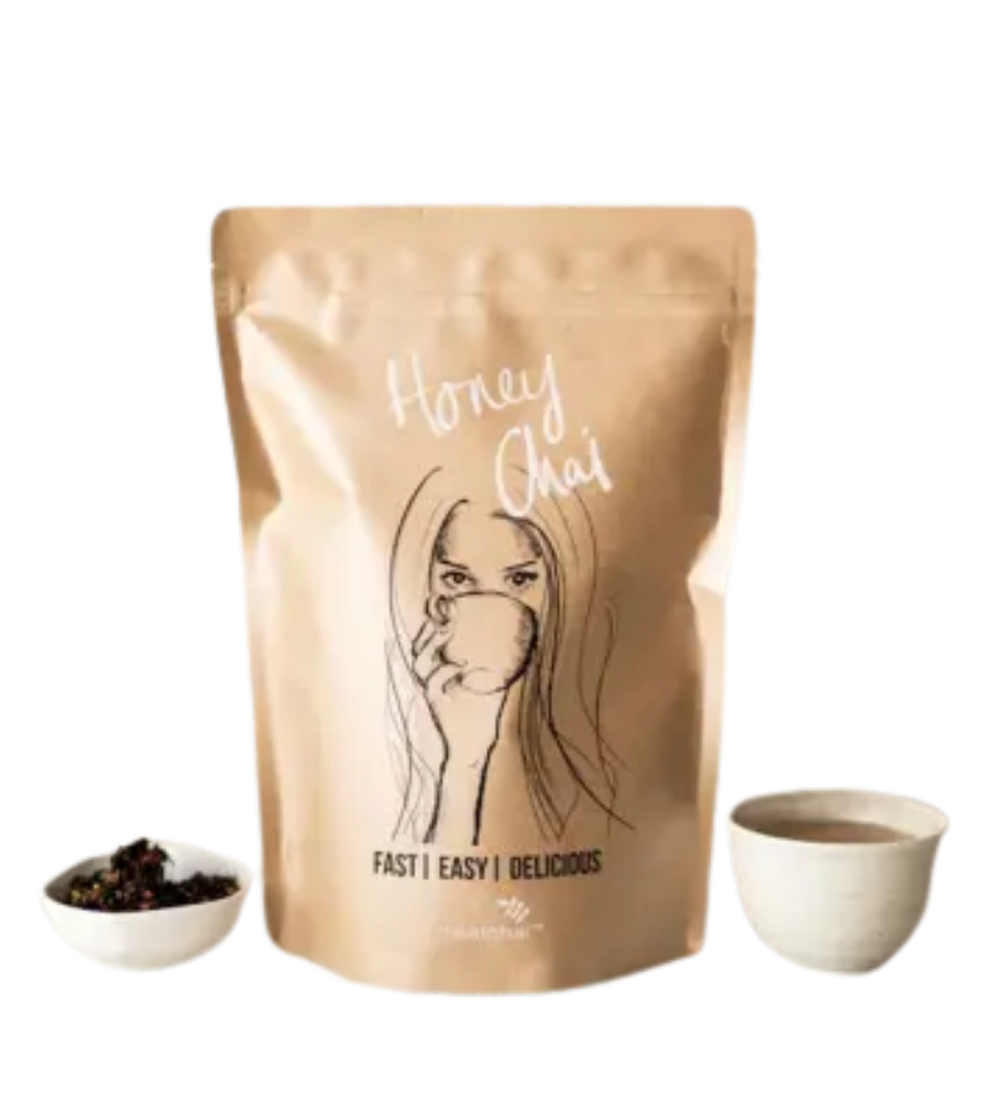 Image of Honey chai with cup of chai latte and loose leaf chai 